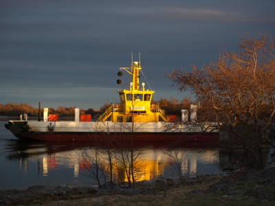 The Seglinge ferry lit by sunset